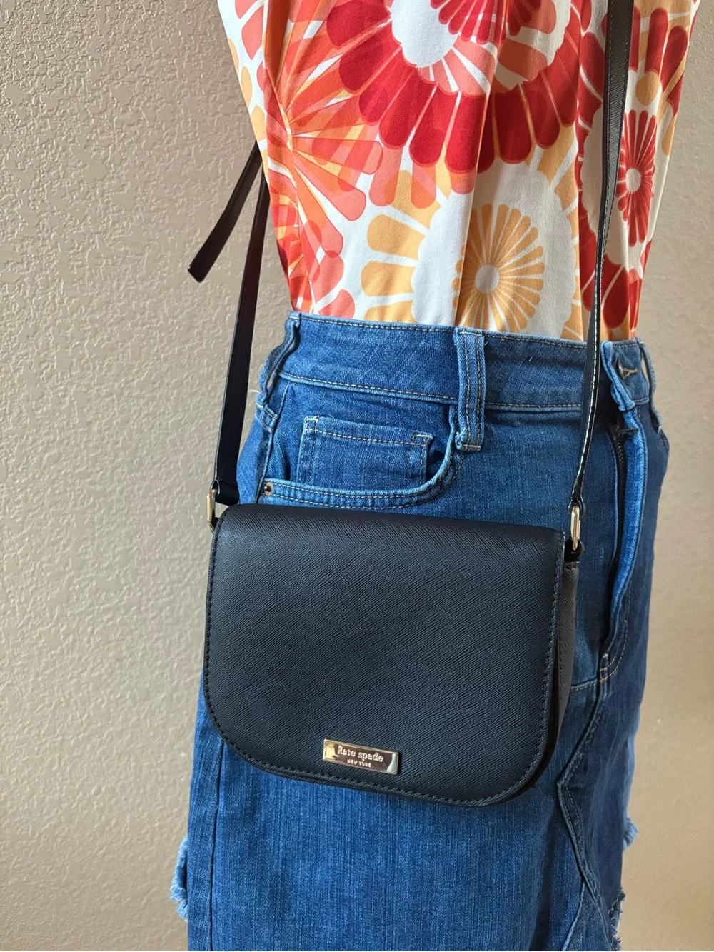 kate spade black crossbody flap bag with gold-tone plate